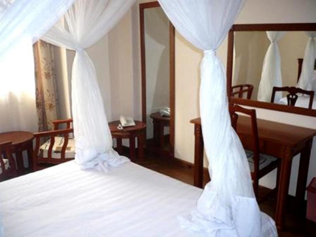 Arusha Tourist Inn Hotel Quarto foto